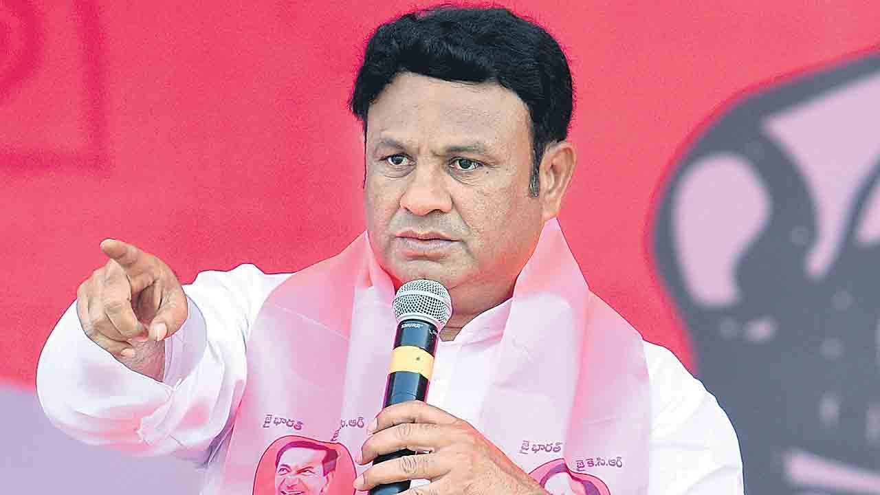 Former MLA Bigala Ganesh Gupta's car damaged after a lorry collision on NH 44 near Baswapur in Kamareddy district