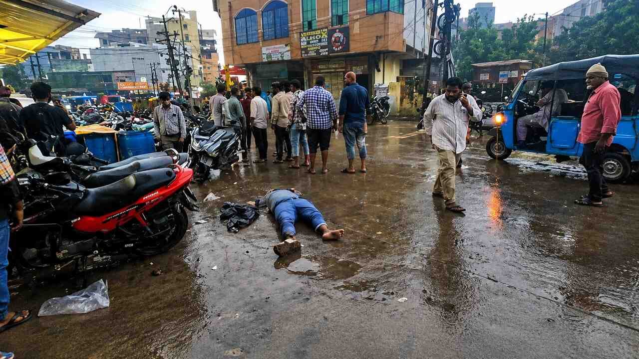Dark rain clouds and flooded roads in Hyderabad as heavy rainfall triggers disruptions and weather alerts across the city.